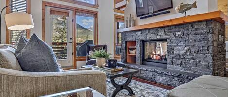 Cozy fireplace and comfortable living area.