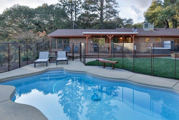 Super clean and well maintained pool with a child proof fence!