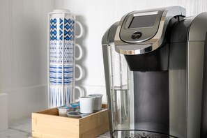 A Keurig coffee machine, generously stocked with complimentary coffee pods for your convenience and enjoyment.