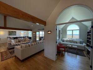 View of the living room with incredible water views all throughout the house