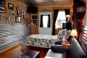Back door leads to private deck. Queen Bed