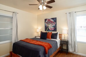 Queen bed - Natural Light - Blackout Shades - Front of Home - Ceiling Fan