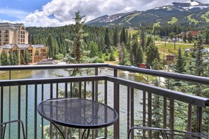 Balcony with bistro table and chairs