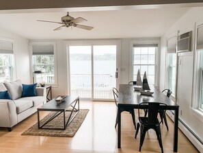 Newly renovated living and dining room ready for games, meals or relaxing.