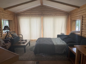Living room converted into cozy sleeping area