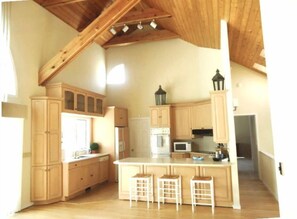 Kitchen with vaulted ceilings