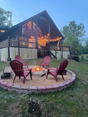 Enjoy an evening of roasting marshmallows just steps away from the cabin.