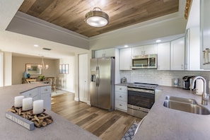 Fully equipped kitchen with stainless appliances
