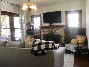 living room with queen size sofa pullout