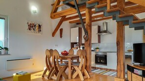 Duplex Gallery dining area with traditional furnishings