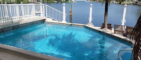 Private pool with water fall.  Side B 9922 is NOT heated. 