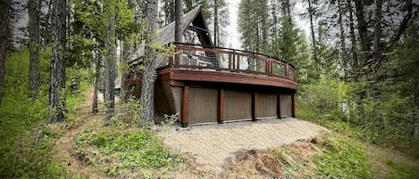 The deck is 7 feet above the ground and nestled amongst the trees.