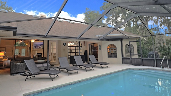 Private pool backing up to the woods