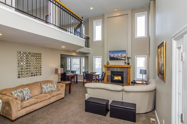 House 3 provides an airy modern feel open to upper level