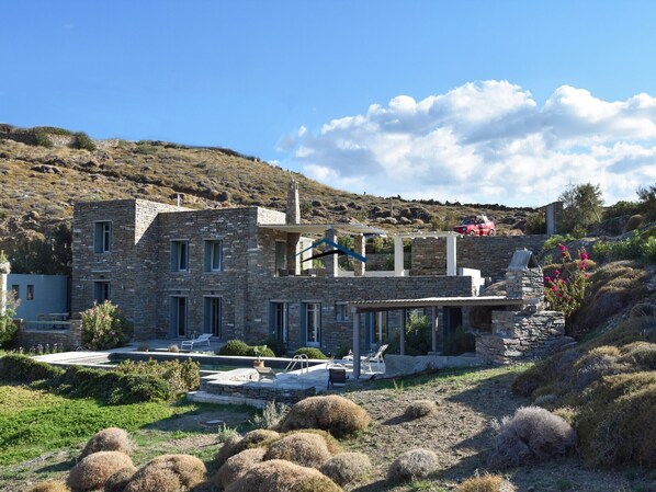The villa and pool area
