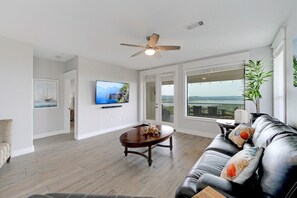 Living with view to balcony and Lake Travis