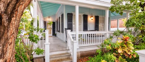 Lovely 1890's Key West Home with wrap-around porch and rooftop deck.  