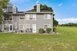 Stretch your legs in the spacious backyard from your corner unit