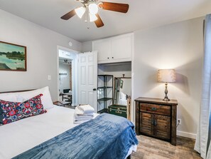 From the cozy bed to the soothing decor, this bedroom makes unwinding oh-so-easy.