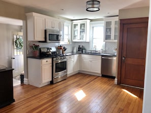 Kitchen featuring stainless appliances and granite countertops!  