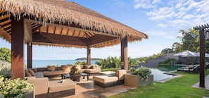 Sangsuri Villa 1 features 2 Salas by the pool