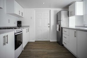 Kitchen with door to rear garden