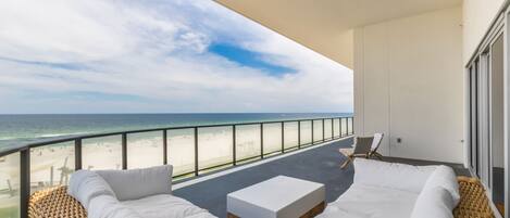 Relax and listen to the waves of the gulf on your balcony overlooking the beach!