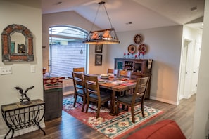 Spacious dining room with cathedral ceiling