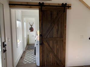 Behind door number one we have a laundry room and a half bath.