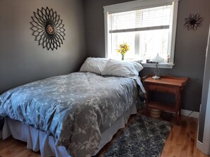 Bedroom with queen bed.