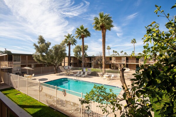 Cool, Mid-Century Modern building with an inviting pool, steps from the condo
