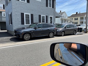 Parking for two cars (front to back) along Atlantic Ave and to the side of house