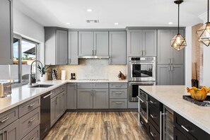 spacious gourmet kitchen, where every meal becomes an extraordinary experience