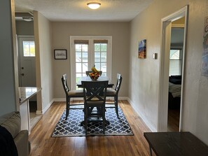 Kitchen table seats 4. Additional chairs downstairs. 