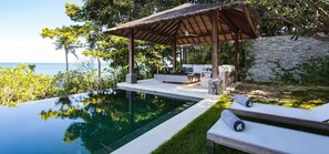 The private shaded poolside sala overlooking the beach