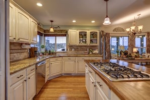 Fully stocked kitchen with mountain views