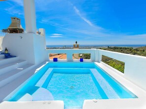 Sky, Property, Cloud, Water, Blue, Azure, Swimming Pool, Building, Outdoor Furniture, Rectangle
