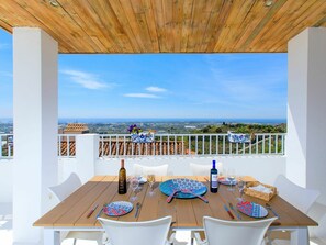 Sky, Table, Furniture, Property, Cloud, Tableware, Seaside Resort, Azure, Blue, Chair