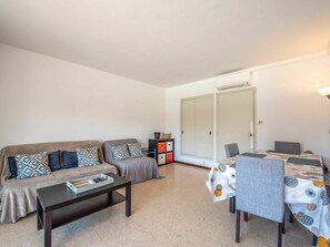 Furniture, Table, Couch, Comfort, Building, Interior Design, Living Room, Flooring, Floor, Door
