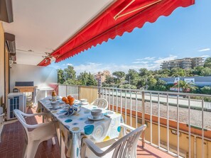 Sky, Property, Table, Furniture, Building, Cloud, Porch, Chair, Shade, Outdoor Furniture