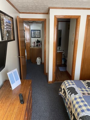 Queen Bedroom #1 of 2 with attached Full Bathroom 1 of 2, and TV 2 of 3