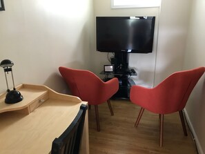 Study, large TV for gaming.