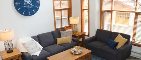 Sofa bed and loveseat in living room - comfortable seating for everyone