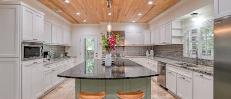 Large kitchen provides plenty of prep space for your family favorites.