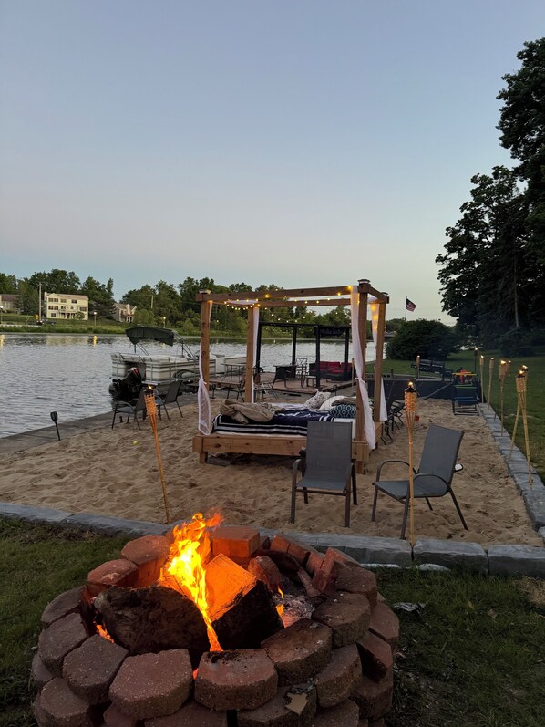 New beach added with Cabana and fire pit. Bags, ladder golf, Jenga and more! 