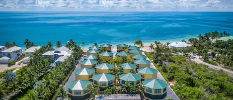 Aerial view of tennis court and property to the Atlantic Ocean & Beach