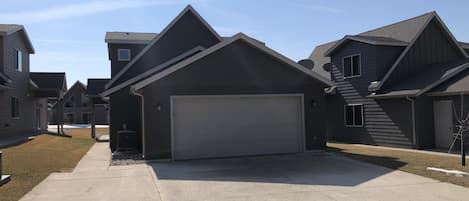 2 car garage with extra wide driveway for additional parking