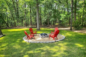 Large backyard with fire pit where you can gather round and create memories!