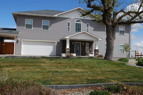 Riverside Retreat. Spacious home with parking in front for several vehicles.