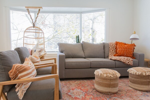 Open Bright Family Room with plenty of seating